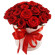 красные розы в шляпной коробке. Катар